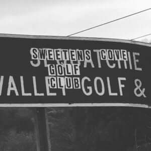 Close-up of Sweetens Cove Golf Club sign – A detailed image of the Sweetens Cove sign, showcasing its rustic design and weathered wood, set against a natural backdrop, capturing the charm and character of this iconic golf course.